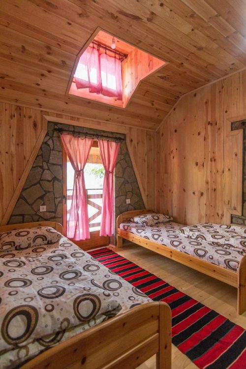 Apartment bedroom in warm wood